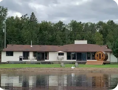 Escape to Sauna & Sunrises, a four-season lake house just 15 minutes from Thunder Bay. With 5 bedroo...