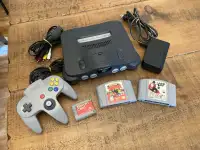 N64 console, controller, Pokemon Snap, NHL 99, memory card