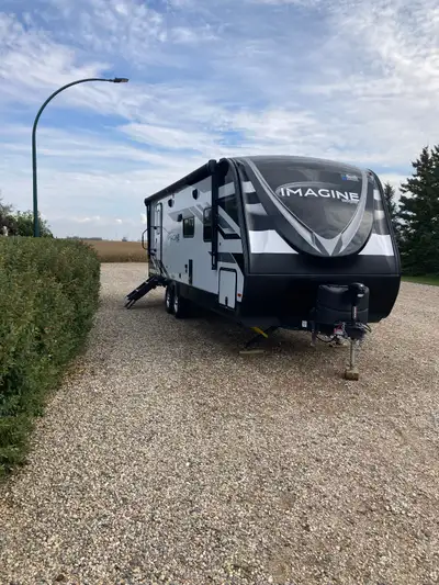 26ft grand design. 12 ft side. Solar panel. Heat & vibration recliners like new always stored in Quo...