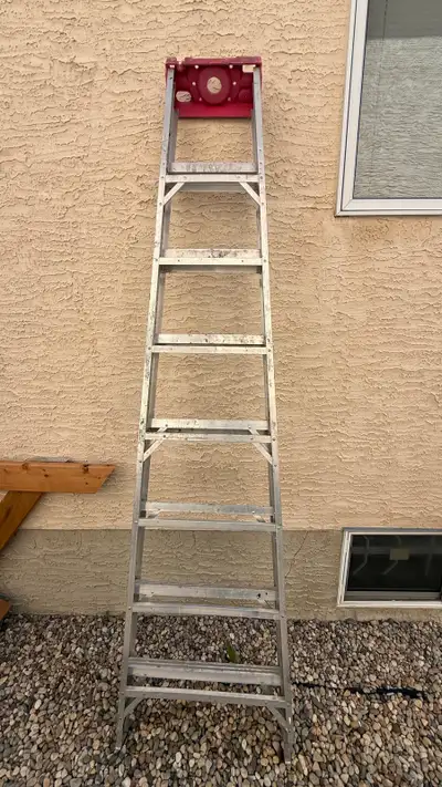 This is a sturdy, professional-grade 8-foot aluminum step ladder that is ready to help you reach new...