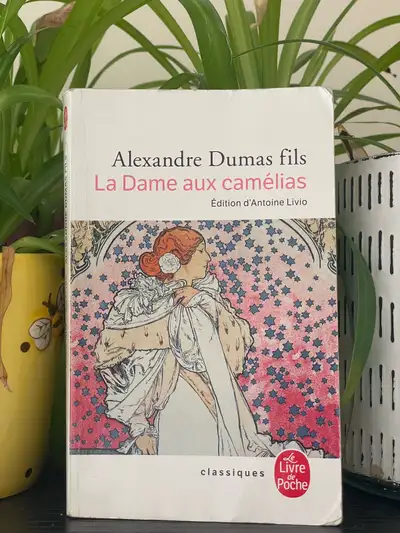 Dive into the tragic romance of Alexandre Dumas fils' "La Dame aux Camélias," a timeless classic exp...