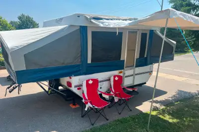 10ft tent trailer for sale 1 king, 1 queen, 1 double beds Sink, 2 burner propane stove with a 20lbs...