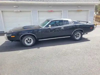 I am selling a 1974 Dodge Charger Se Brougham edition car. Factory black with original 360 engine an...