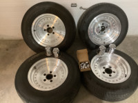 American Racing rims 15”x7” with tires.