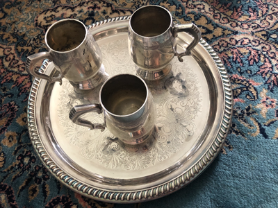 Selling a set of three silver cups and the tray. The cup - as it says at the bottom - are E.P.N.S. (...