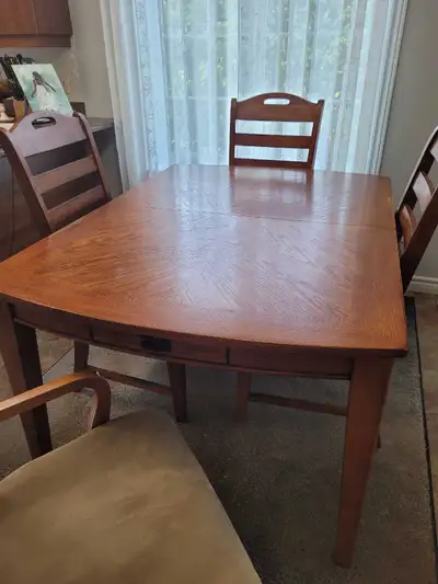 hard wood table with 6 chairs, View more