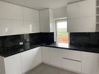 Elegant Black Marble Kitchen & Staircase Design, View more