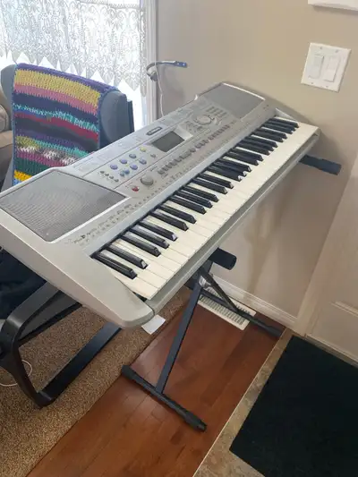 Yamaha Electric Keyboard and Stand, View more