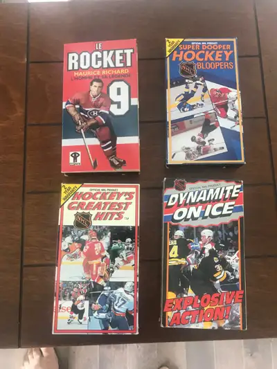 Set of 4 VHS hockey cassettes $10 for all 4. Lot de 4 cassettes de hockey VHS 10 $pour les 4.