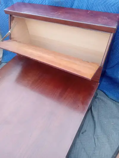 This STRONG SOLID WOOD SINGLE BED FRAME WITH COMPARTMENT S ONLY IN 2 PEICE JUST NEEDS A MATTRES CAN...