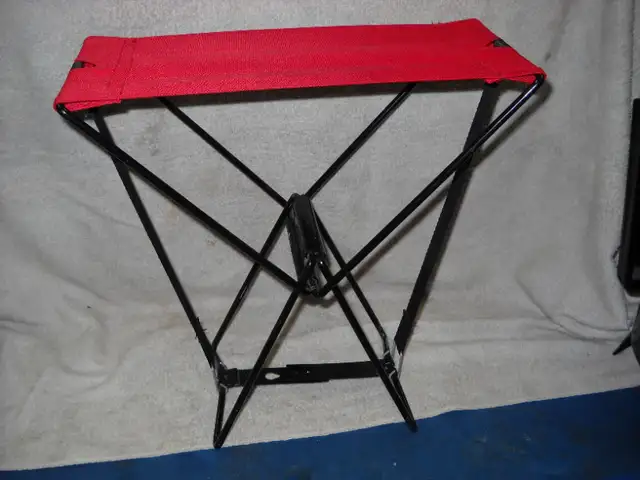 Compact folding chair for fishing or other uses. Easy to open.