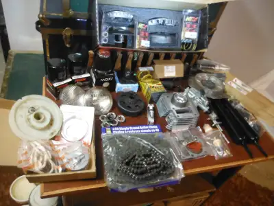 New Small Engine Parts and Accessories. Not sure what anything is for. A small dune buggy I think. N...