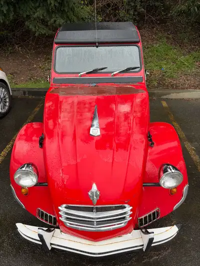 This is a modified Citroen 2CV with a four cylinder from a GS Citroen known as The James Bond Conver...