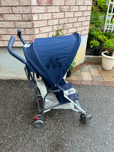 Maclaren stroller. Fair condition, All function work. One front wheel makes squeeze sound, but still...