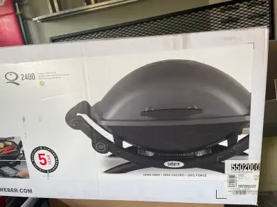 New in box Weber Q2400 Electric bbq with base/stand. Great for condo area balconies.