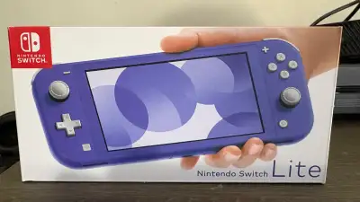 Brand new!!! Nintendo switch Lite!!! Never opened!!! **Blue!! ‼️‼️Unopened Nintendo Switch Lite Purc...