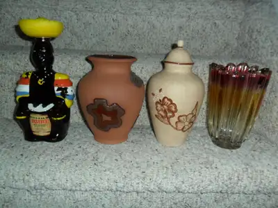 Vintage Vases. Ceramic vases are locally made and hand painted., View more