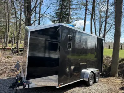 This Lightning enclosed trailer is perfect for hauling your equipment, tools, or recreational vehicl...