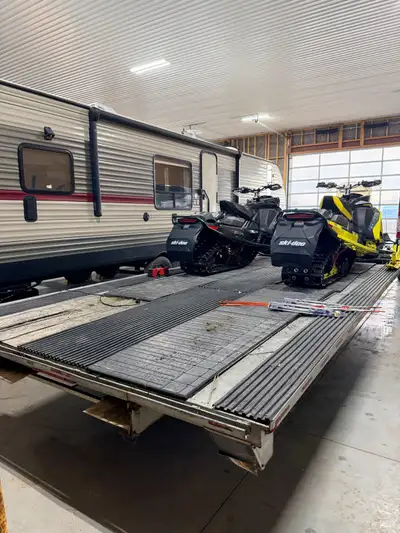 4 bed snowmobile trailer. Tows great. Lights work. Solid trailer. Tuck away ramps. Text 5192610349