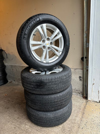 225/65/17 Michelin summer tires on Chevy rims (5x120)
