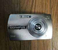 $40 Olympus Stylus 710 weatherproof digital camera charger, card