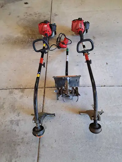 2 27cc troy bilt trimmers. 1 rototiller attachment and an electric starter. 1 trimmer is almost bran...