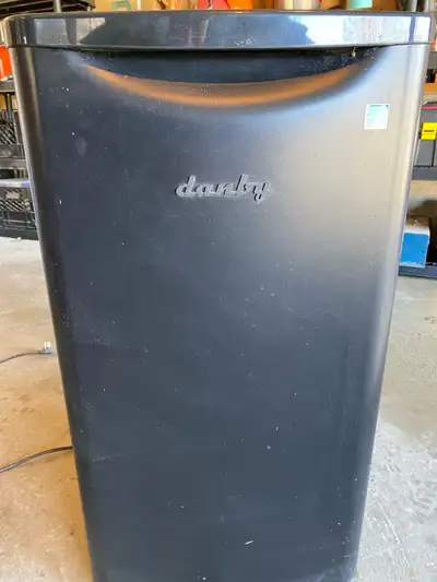 Danby mini bar fridge - black 20 1/2” D x 17 1/2” W x 33” H $50