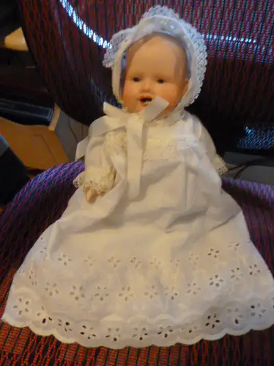 12" doll wearing a complete eyelet dress with matching hat, bloomers and slip. My mother made it whe...