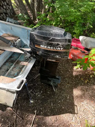 20 hp Mercury outboard 14’ Princecraft Trailer Anchor, paddles, seats included. The 2 front seats ar...