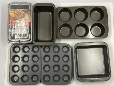 Loaf Pans, Muffin Pans, Cake Pans. Wilton and Baker’s Secret, View more