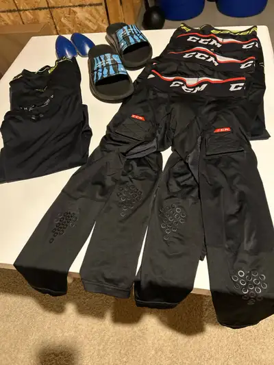 Youth hockey gear from $5-$20 size large  /Bauer slides size 42, View more