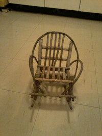 Antique 1915 twig furniture doll rocking chair.