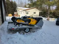 Snowmobiles and trailer 