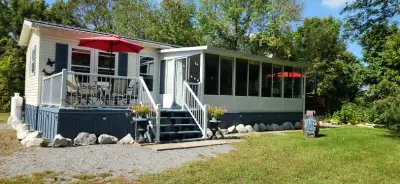 Welcome to your summer home away from home. This trailer is located on a large private site. Fully f...