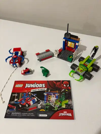 Missing Spider Man minifiqure Missing head and claw from Scorpion Minifiqure Missing 1 blue piece as...