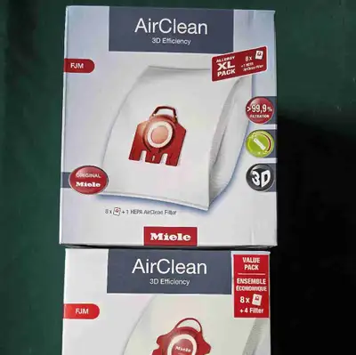 Two sealed brand new boxes of original Miele FJM vacuum bags (see picture for compatible vacuum mode...