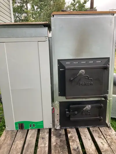 combination forced air wood-electric heating system, View more