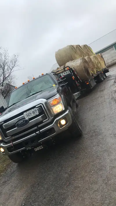 Flatbed trucking for equipment and hay, View more