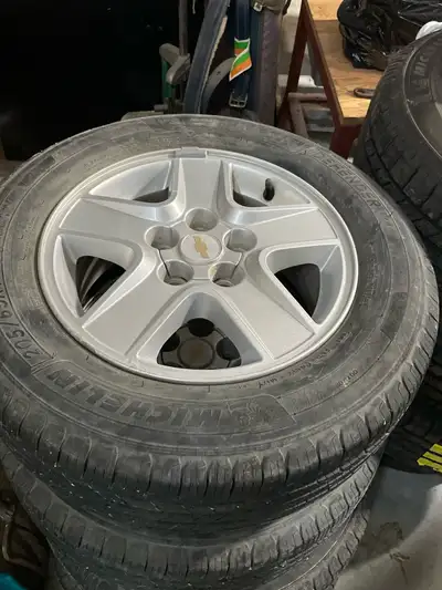 Chevy rims 15” 5x110mm bolt circle 8/32 tread depth . Set of 4