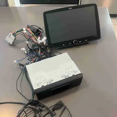 BOSS Audio BE10ACP car stereo. Large touch screen. Supports Apple CarPlay and Android Auto. Adjustab...