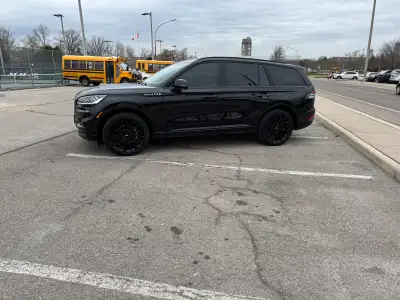 Looking to take over a lease on a sleek and powerful 2023 Lincoln Aviator Reserve, a luxurious SUV t...