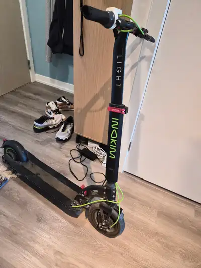 Inokem light Electric Skooter 4 years old, runs good, kickstand has broken off, and the left tip of...