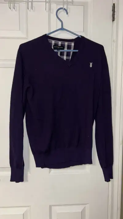 This is a Bruun & Stengade knit sweater, perfect for adding a touch of sophistication to any outfit....