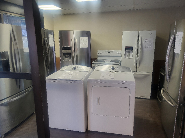 Like new stainless steel fridges and stoves up to a year warran in Refrigerators in Edmonton - Image 2