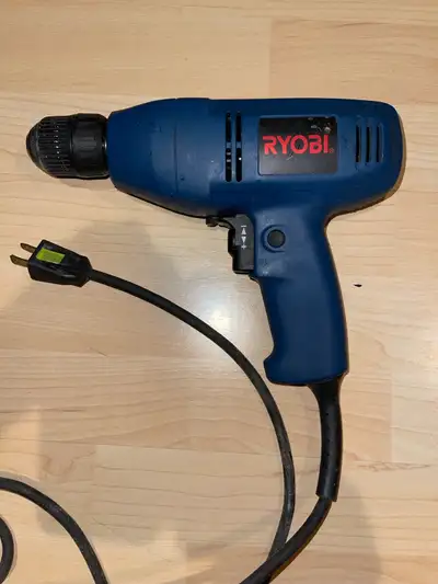 This is a Ryobi D28VSR corded drill that's ready to tackle your drilling needs. It's in used conditi...