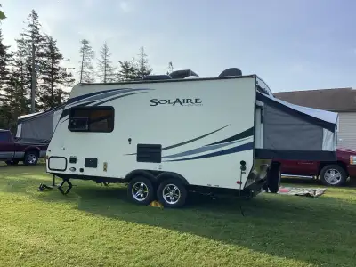 Easy to haul 3600 los. Double Axel, Spare tire. Sleeps 6 to 8 people. Two push out Queen beds. Couch...