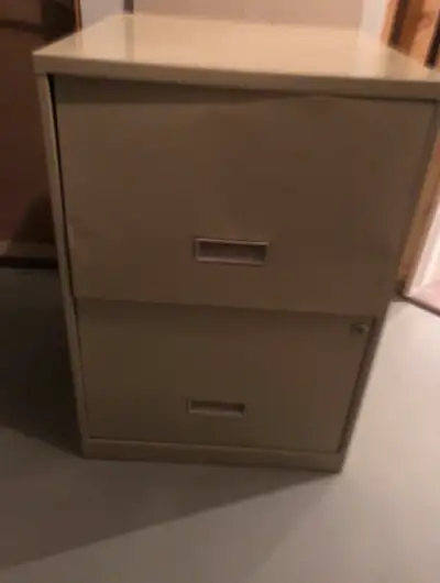2 drawer filing cabinet. Drawer has dent. No longer have key. $10 Check out my other ads Located in...
