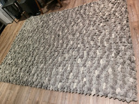 Custom rug, cushions, and art piece 
