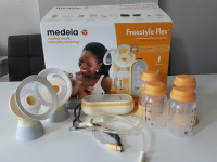 Medela Freestyle Flex breast pump w/ accessories & nursing pads