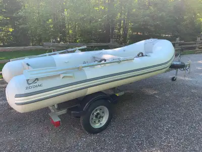 2014 Zodiac 360 air floor,2019 Suzuki 15Hp 4 stroke like new(less then 10 litres of fuel used on thi...